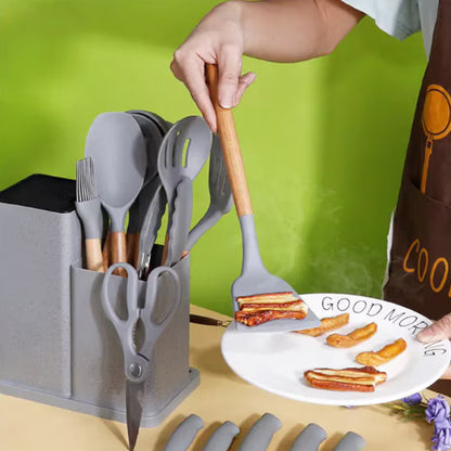 Set 19 Piese Ustensile Bucătărie, din Silicon Alimentar si Lemn, Termorezistente, Include 11 Ustensile, 5 Cuțite, 1 Tocător, 1 Foarfecă și Suport